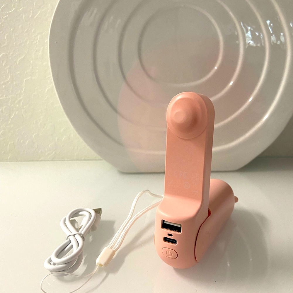 JISULIFE mini handheld fan. 3 in 1, flashlight, power bank, rechargeable fan